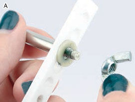 wing nut being screwed onto tool